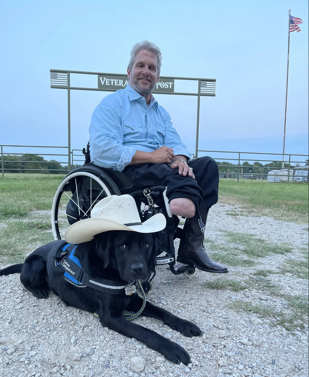 Jason Morgan at the Veterans Outpost ranch with his service dog Yago