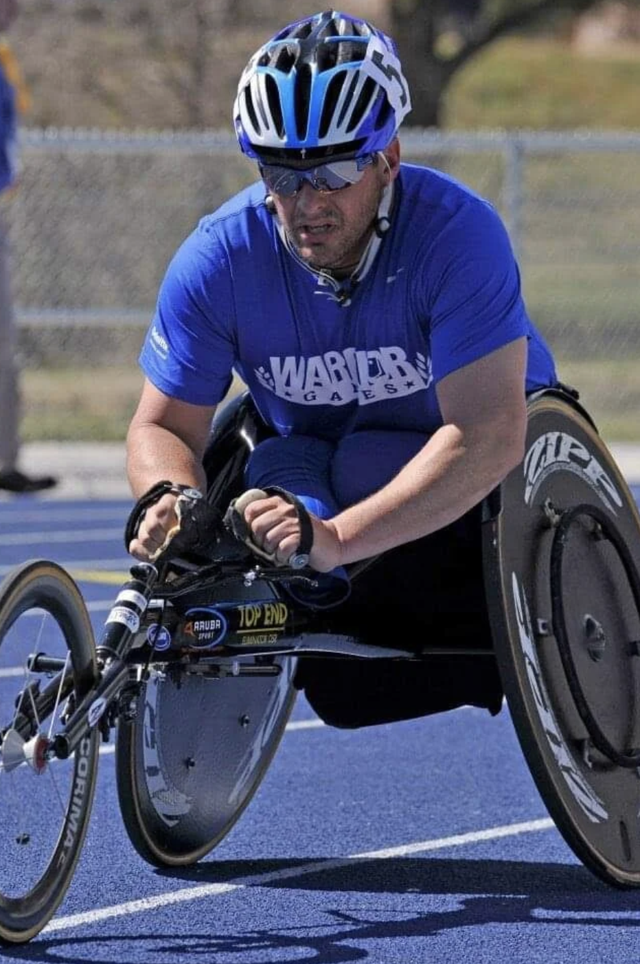 Jason Morgan racing a hand cycle at the Warrior Games